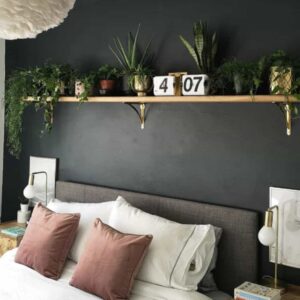 floating shelve in black themed bedroom