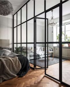 large glass in black bedroom