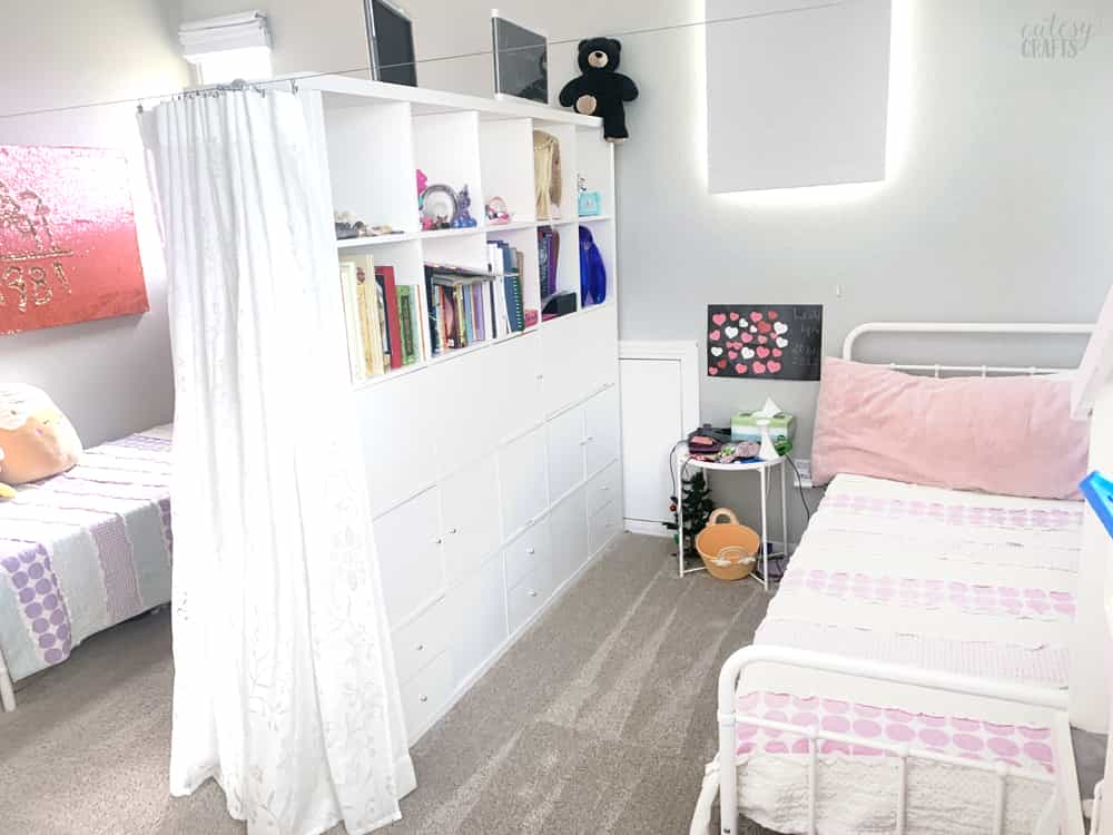 A dorm with a divider to create some personal space