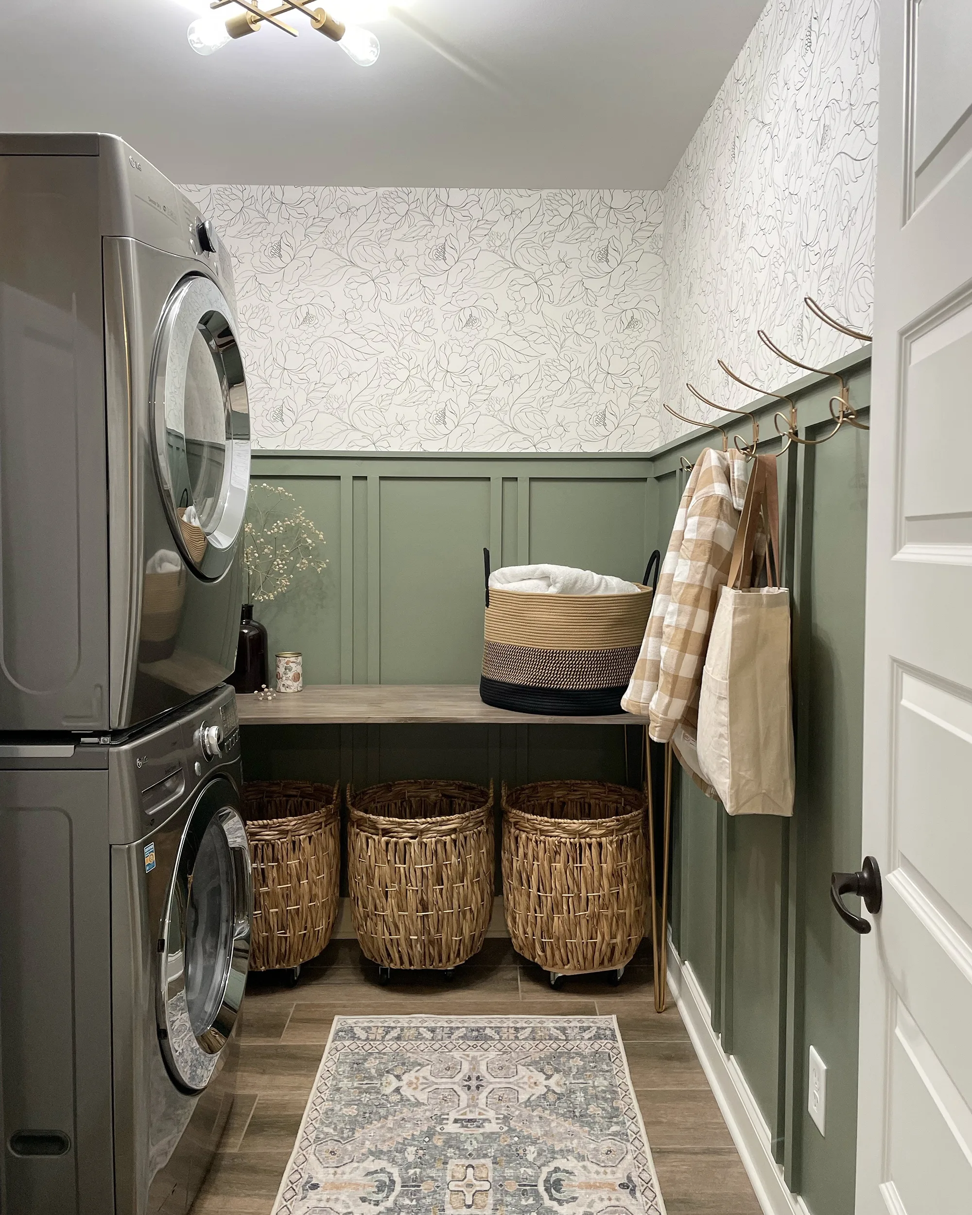 A laundry room with green open shelving