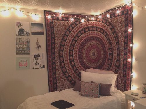 A dorm with hanging tapestry to create some personal space