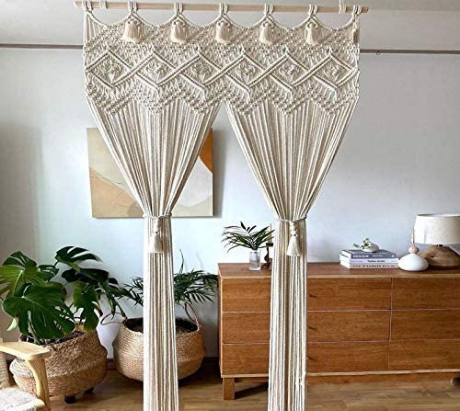 A dorm with macrame curtains to create some personal space