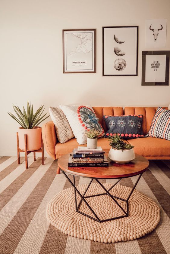 A Scandinavian-inspired Orange Couch Living Room