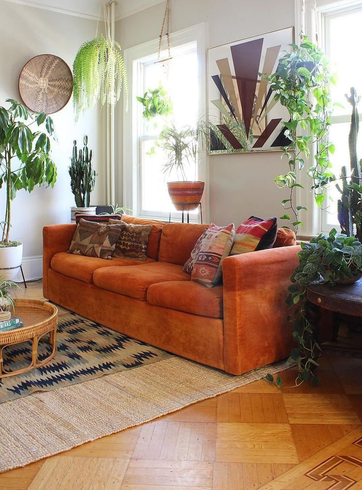 A vintage vibe living room with orange couch