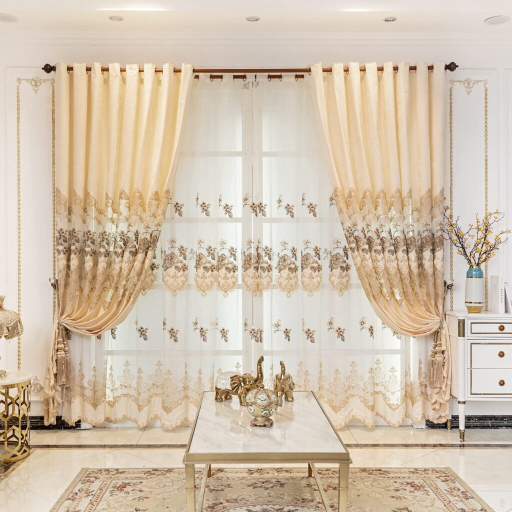 A living room with embroidered sheer curtains 