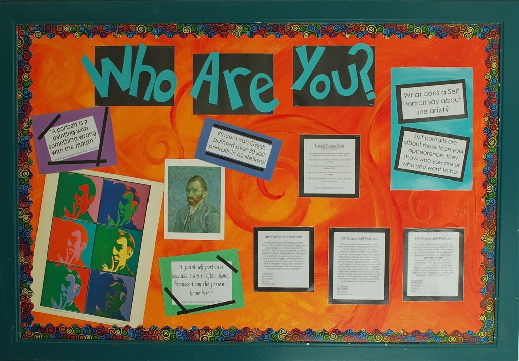 A bulletin board with motivational quotes from famous artists 