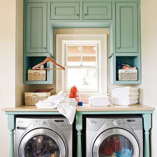 A laundry room with shadow boxes 