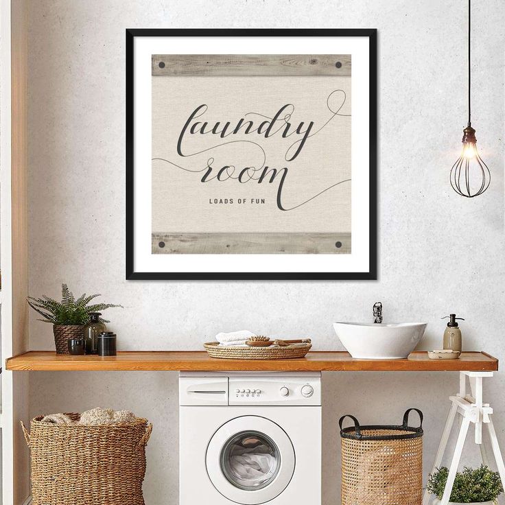 A laundry room with typography print 