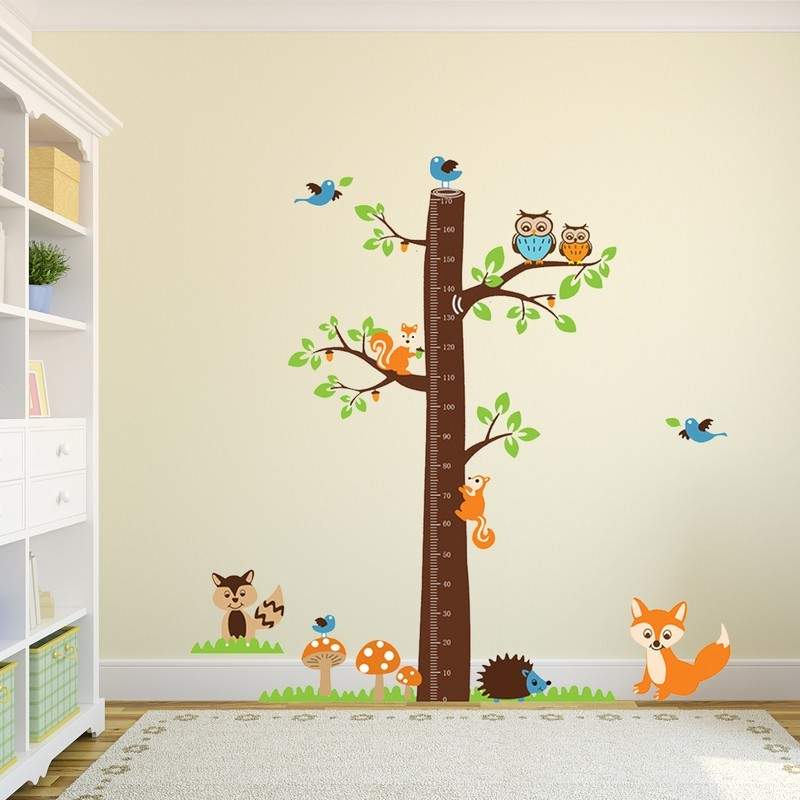 A jungle theme brown color growth chart on wall