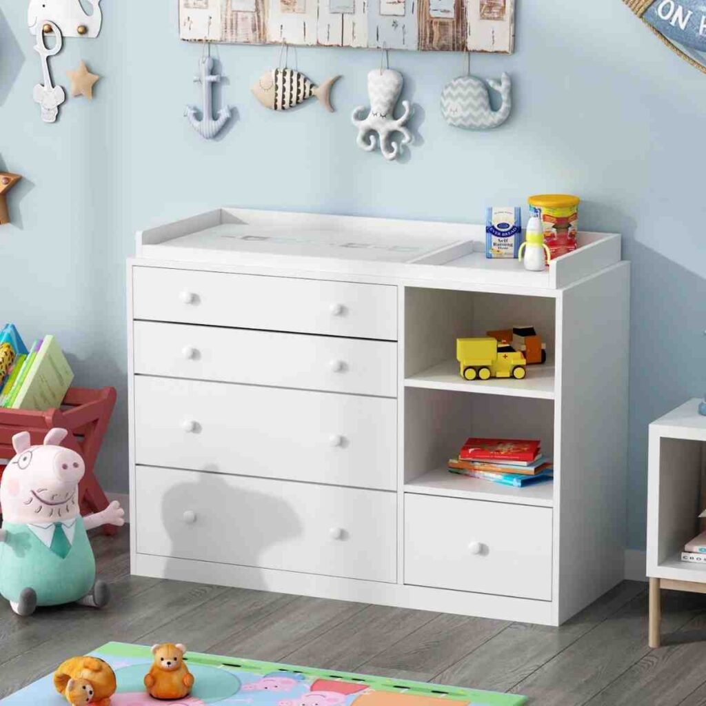 A white dual purpose dresser to change baby pads and to store toddler and baby related items