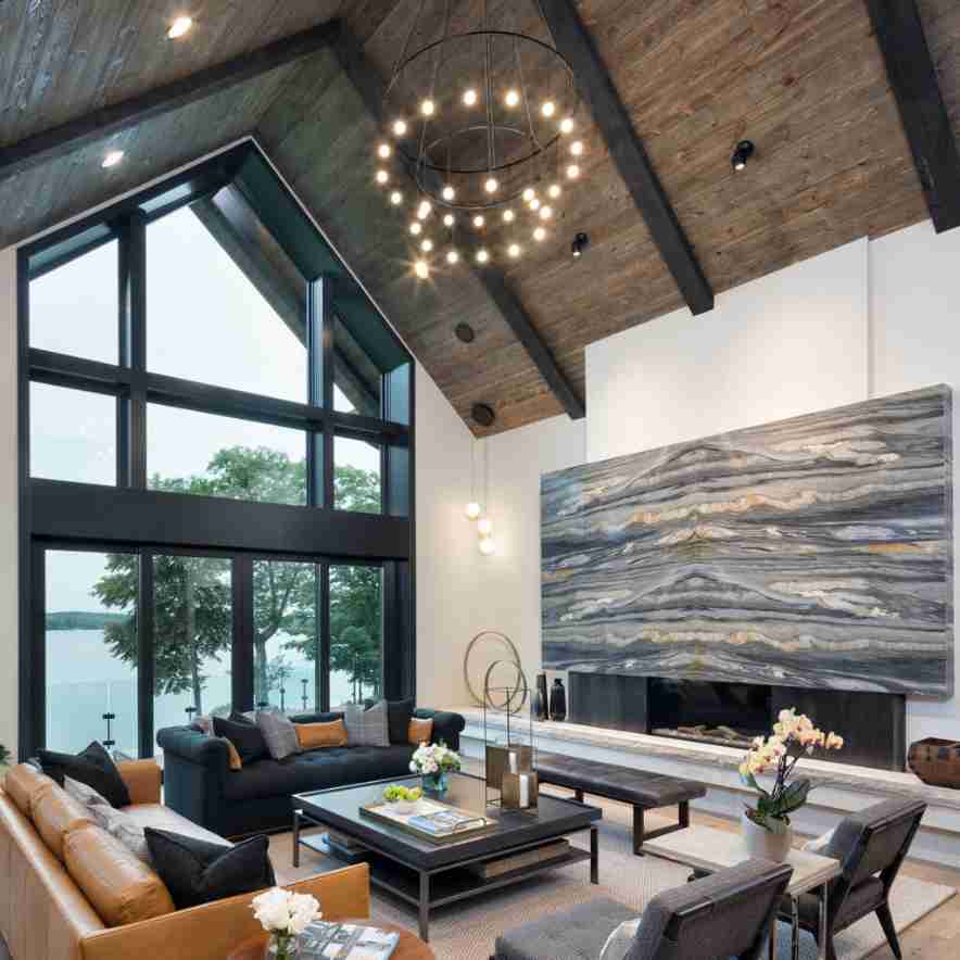 Black framed floor to ceiling picture window in a living room