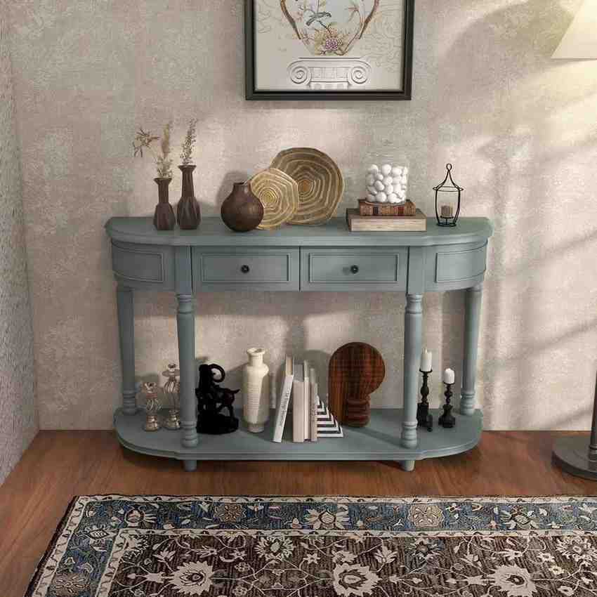 Teal turquoise Cost way console table against cream wall