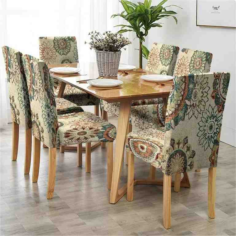Cream color fabric with multi colored flower printed on it for the chair