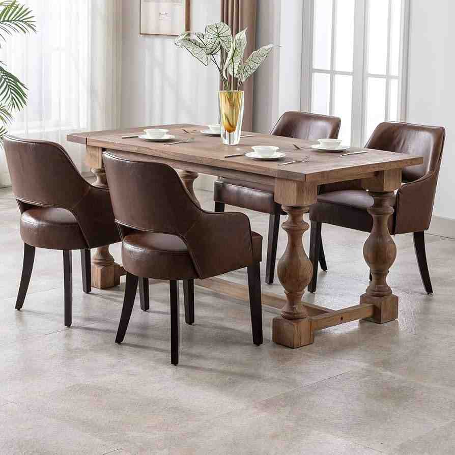Dark brown color leather seating dining chair and a dark brown dining wooden table