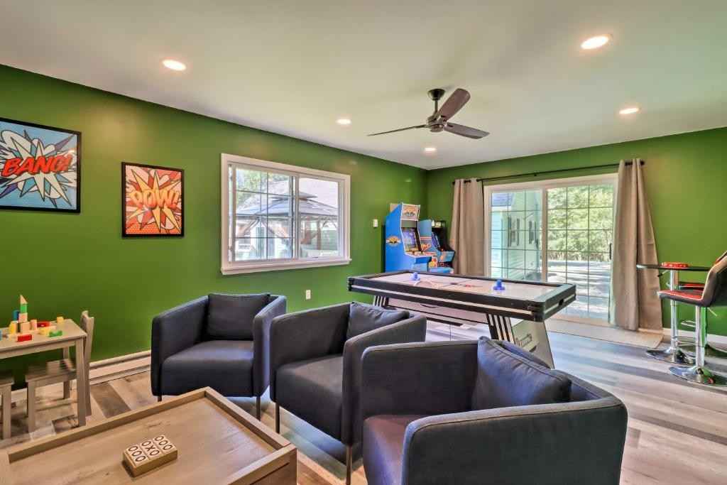 Olive green walls and grey color seating area for game room