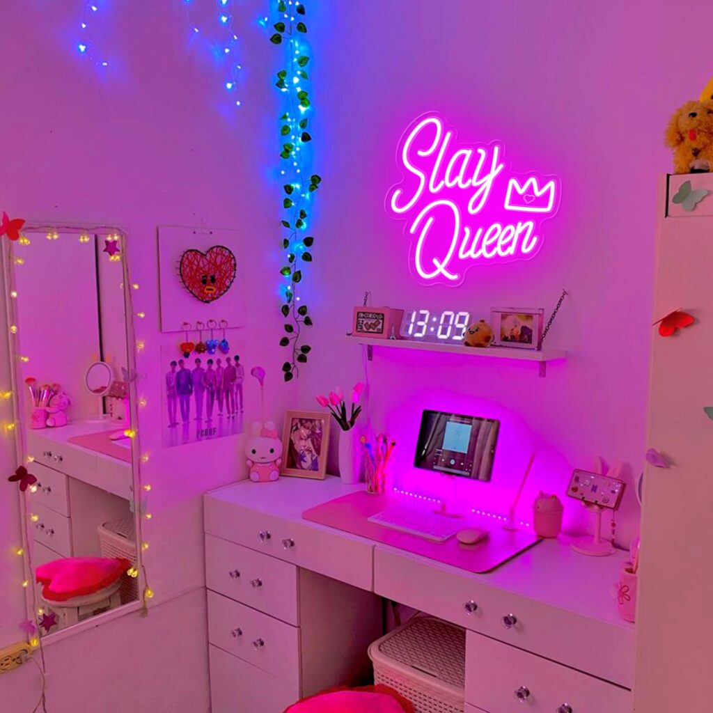Pink neon sign hanging above the vanity