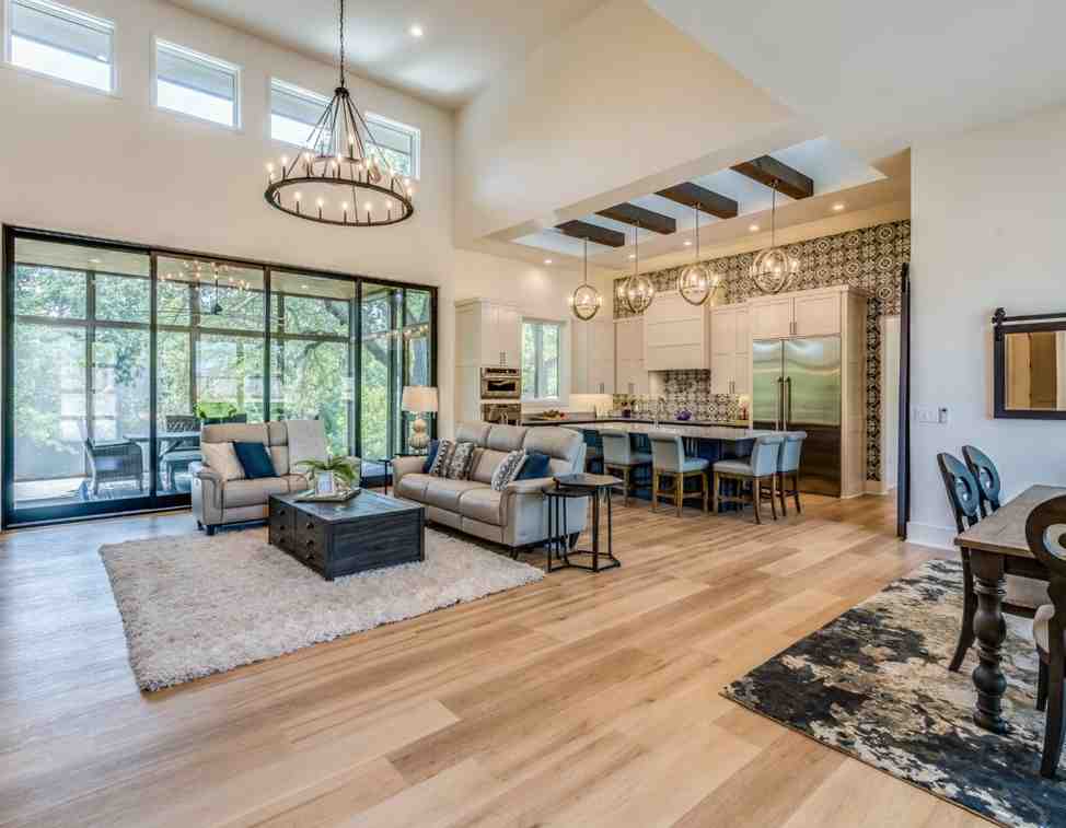 Different color rugs under sofa and dinning table