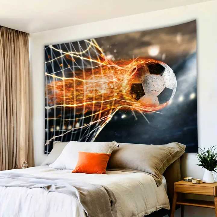 A soccer ball tapestry hanging above the bed
