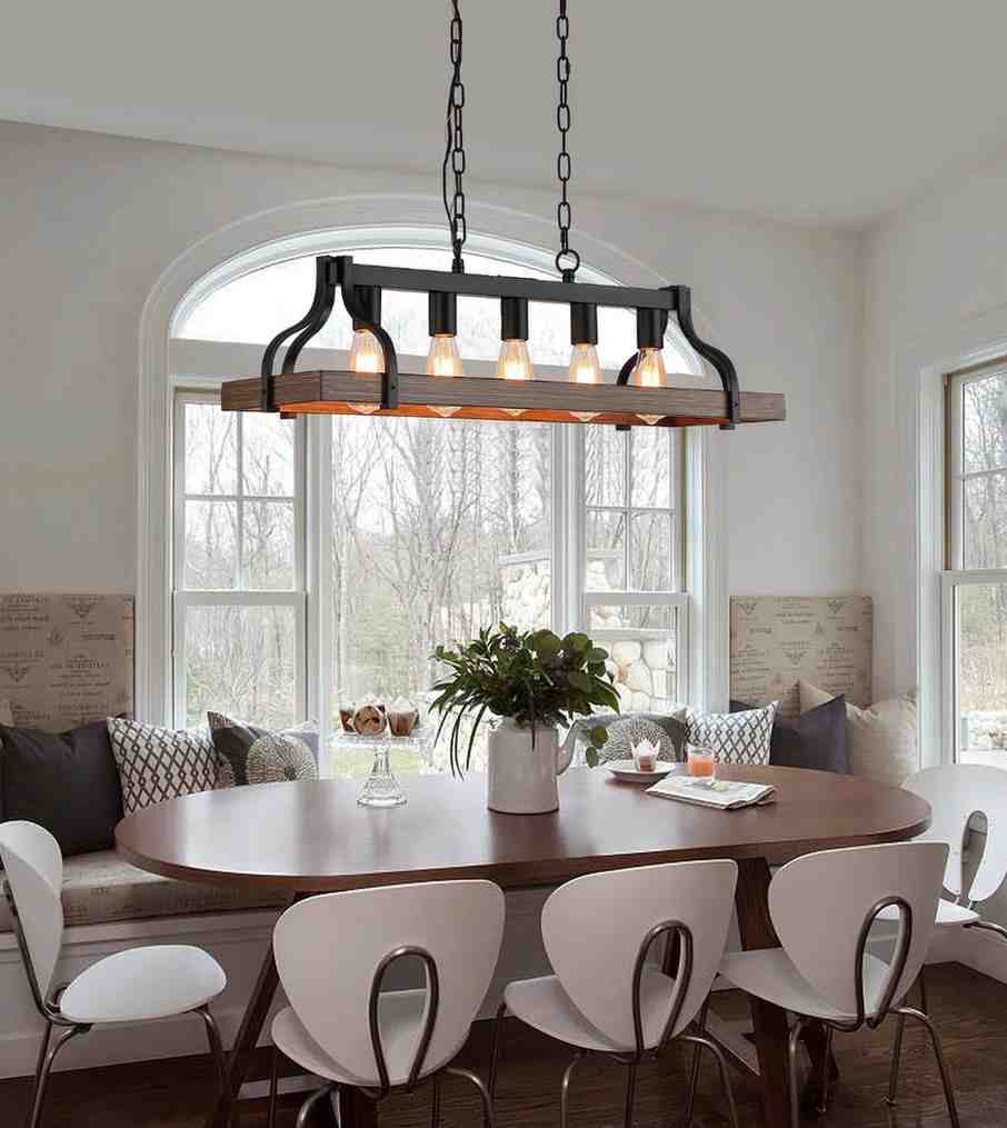 Wooden and black accent light fixture above the dining table