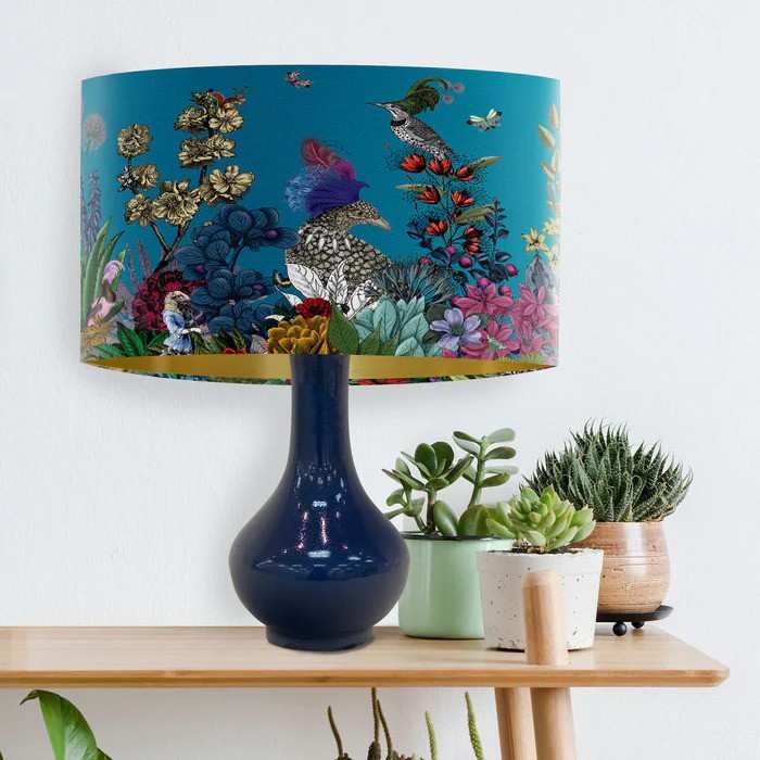 Teal turquoise floral lampshade against cream wall for the living room