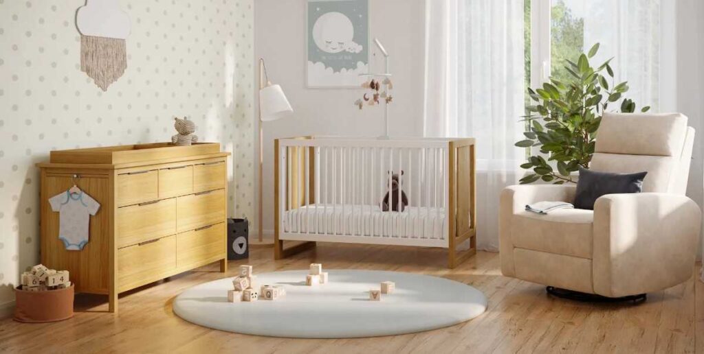 Wooden flooring with a crib and a cabinet with chair in the room