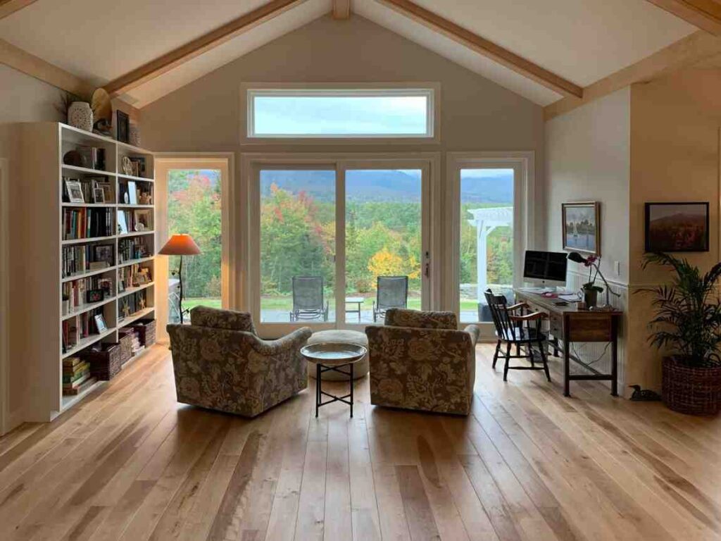 Wide wooden plank flooring for the room