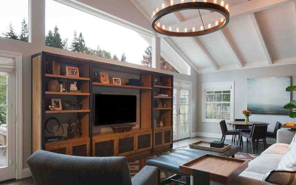 A wooden panel cabinet for the TV unit in a room