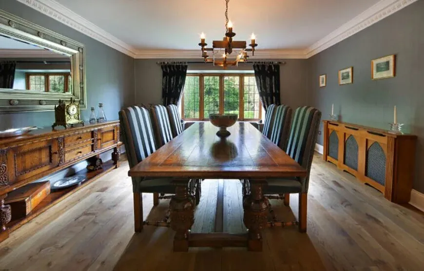 Wooden cabinets and dining table in the room
