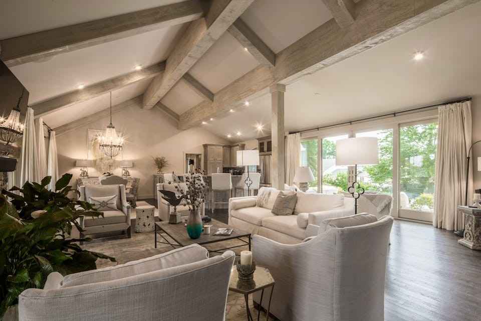 Wooden exposed beams in a vaulted family room