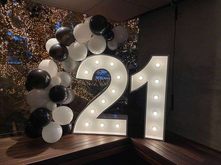 White color 21 number age sign 