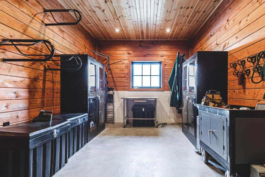 Black cabinet and storage box and wooden ceiling and wall with marble flooring