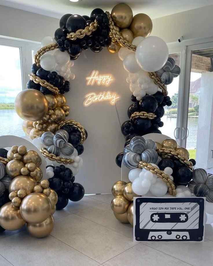 Golden, black, and white color balloon arc for the birthday party 