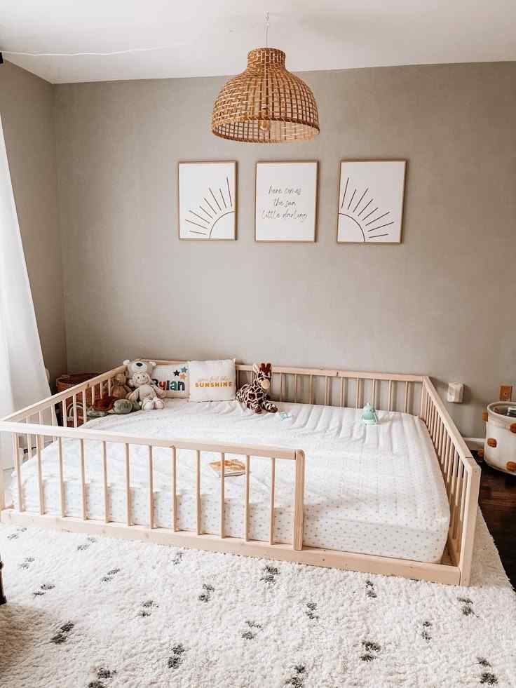 Floor based crib for the baby and toddler and a jute ceiling lamp 