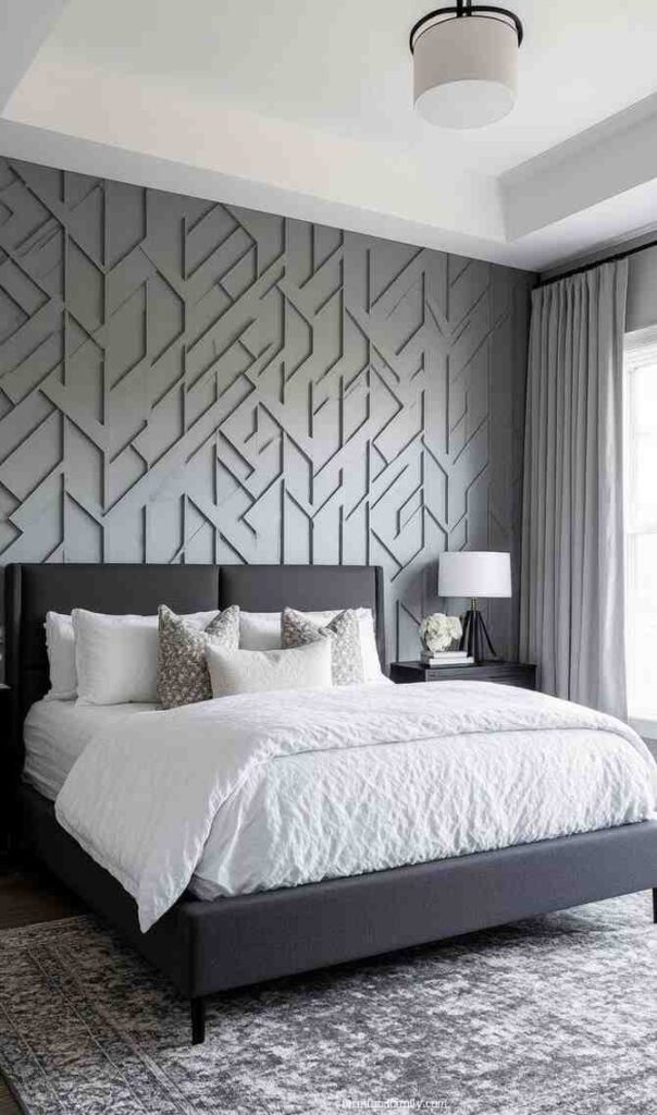 Geometric patterned wall behind the bed and a rug under the bed