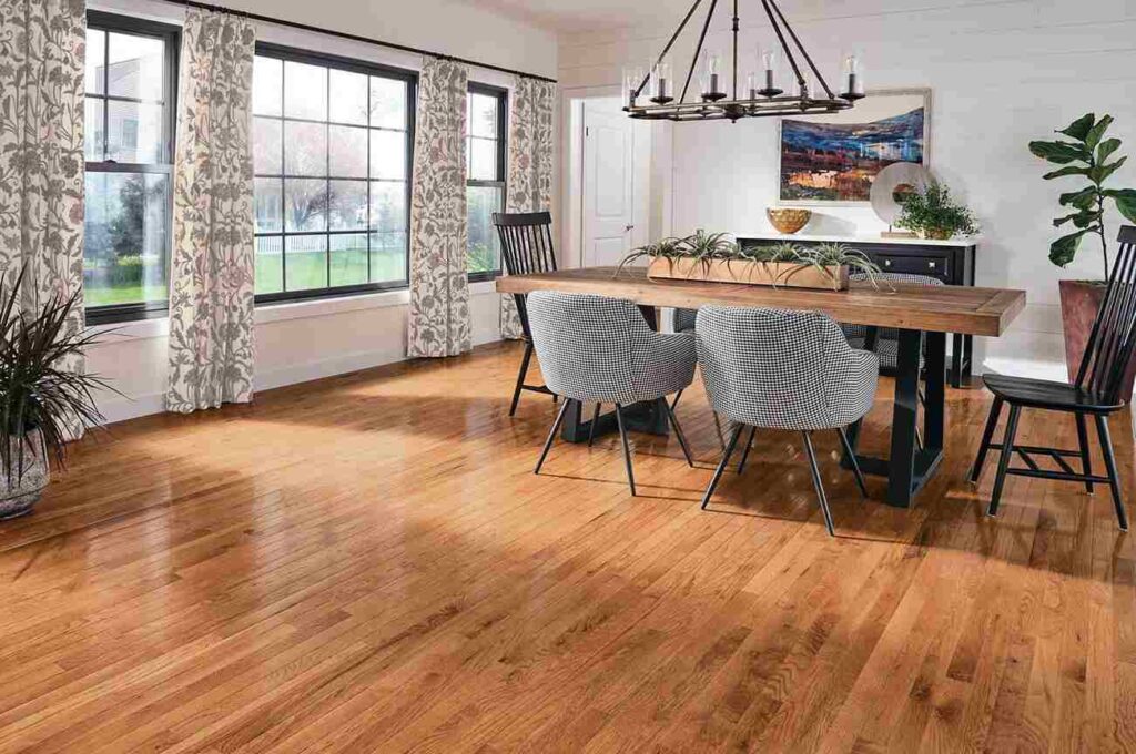 Light curtains and big windows and a wooden dinign table