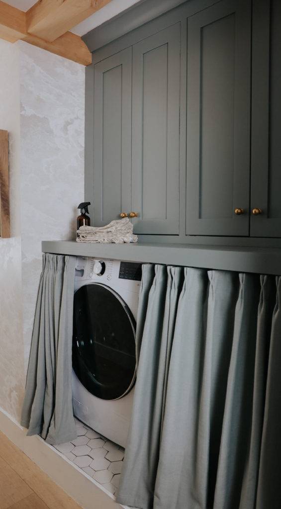 Grey color curtains and mint green cabinet 
