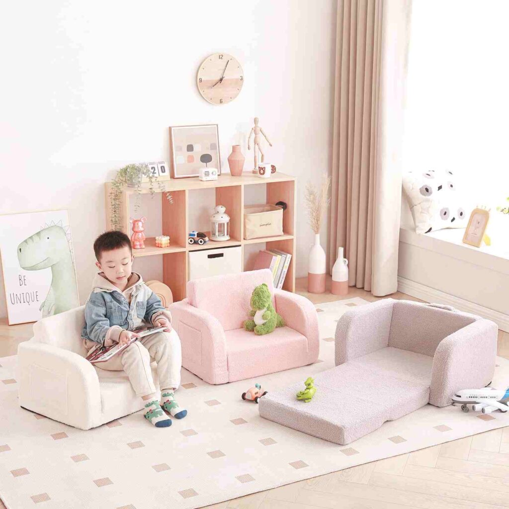 Pink and white color three convertible floor cushion sofa and a rug under it