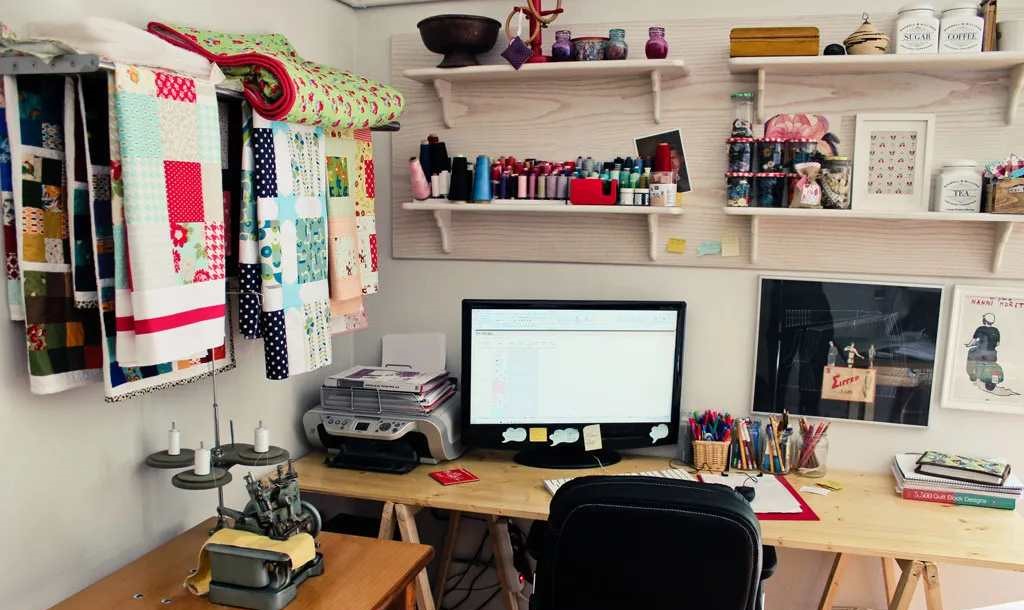 Sewing room with a table and chair
