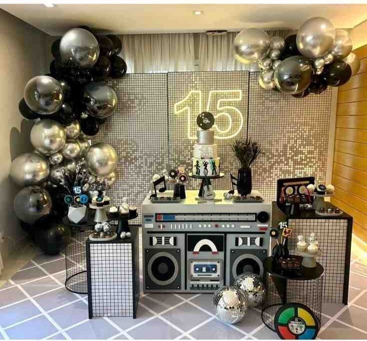 Silver and black color music set up for the birthday party