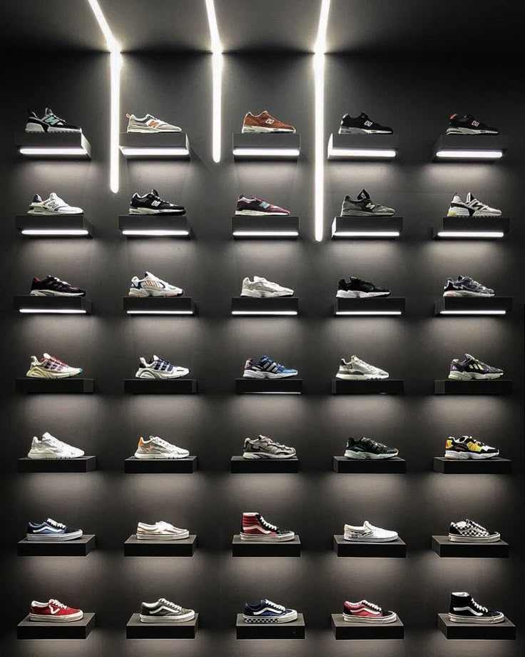 Track lights on sneaker white shelve wall