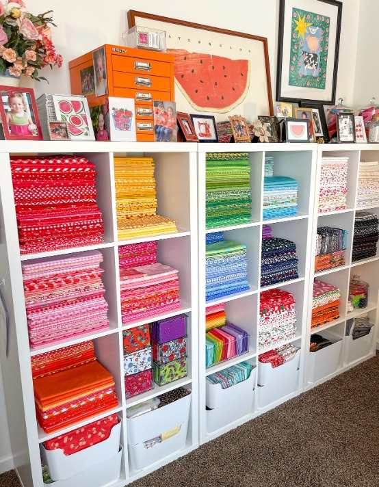 White cabinet with storage for the fabric and other items