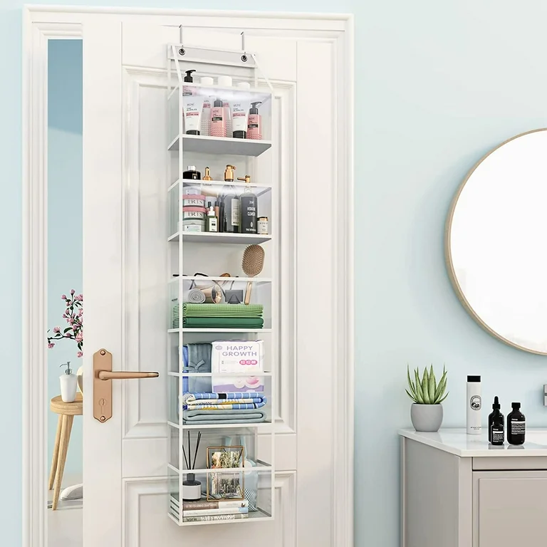 White color over the door organizer on white door and some essential things in it