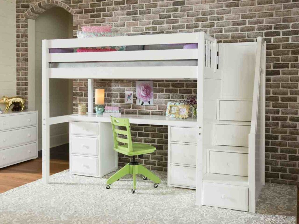 A white loft bunk bed and a desk under it