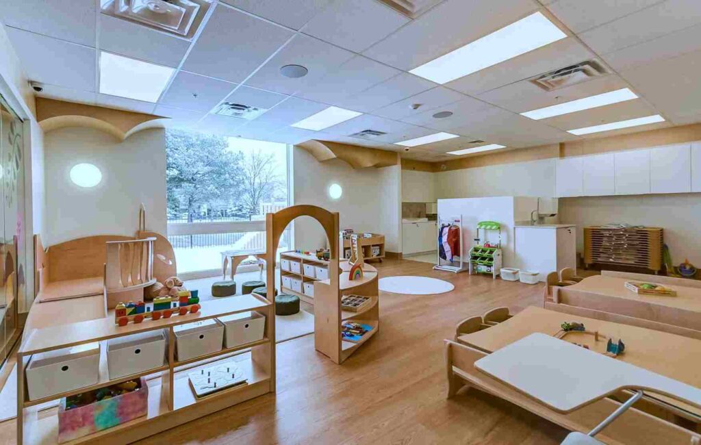 Floor to ceiling window and wooden furniture for the kids in day care