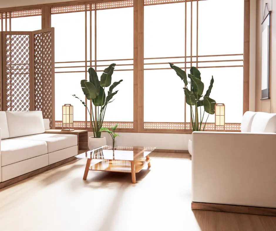 Wooden frame picture window and a two sofa set and  a center table and two plants