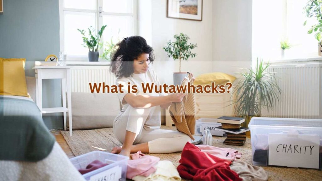A plastic box in corner with clothes in them and a girl flooding clothes 