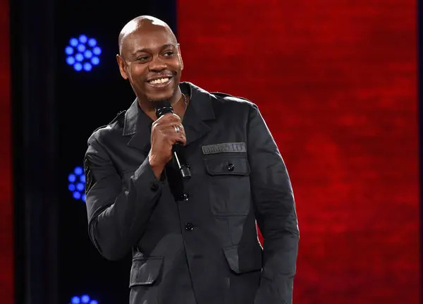 An Image of Dave Chappelle on Stage