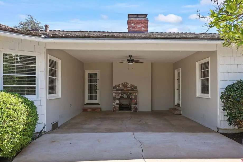 Outside Fireplace of Adam Sandler Home