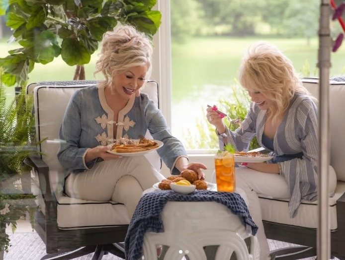 Dolly and her friend in the Sunroom of Dolly Parton Home