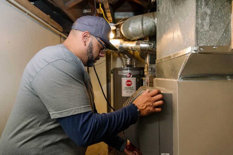 a-electrician-repairing-a-heater